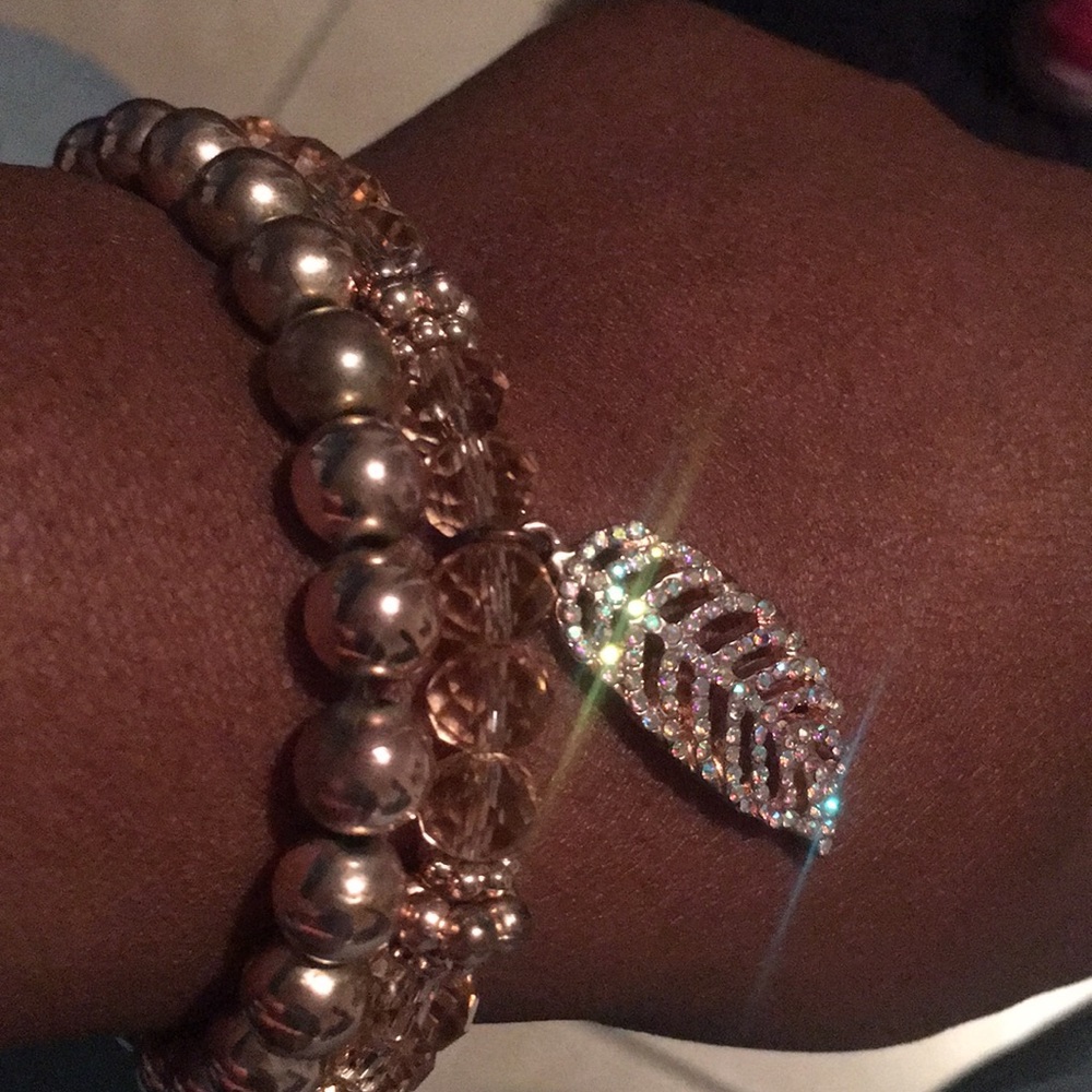 Rose gold feather charm bracelet